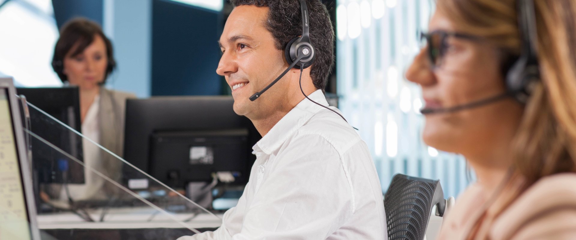 Men and women answering calls