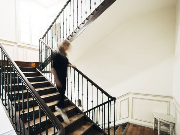 Woman walking down the stairs